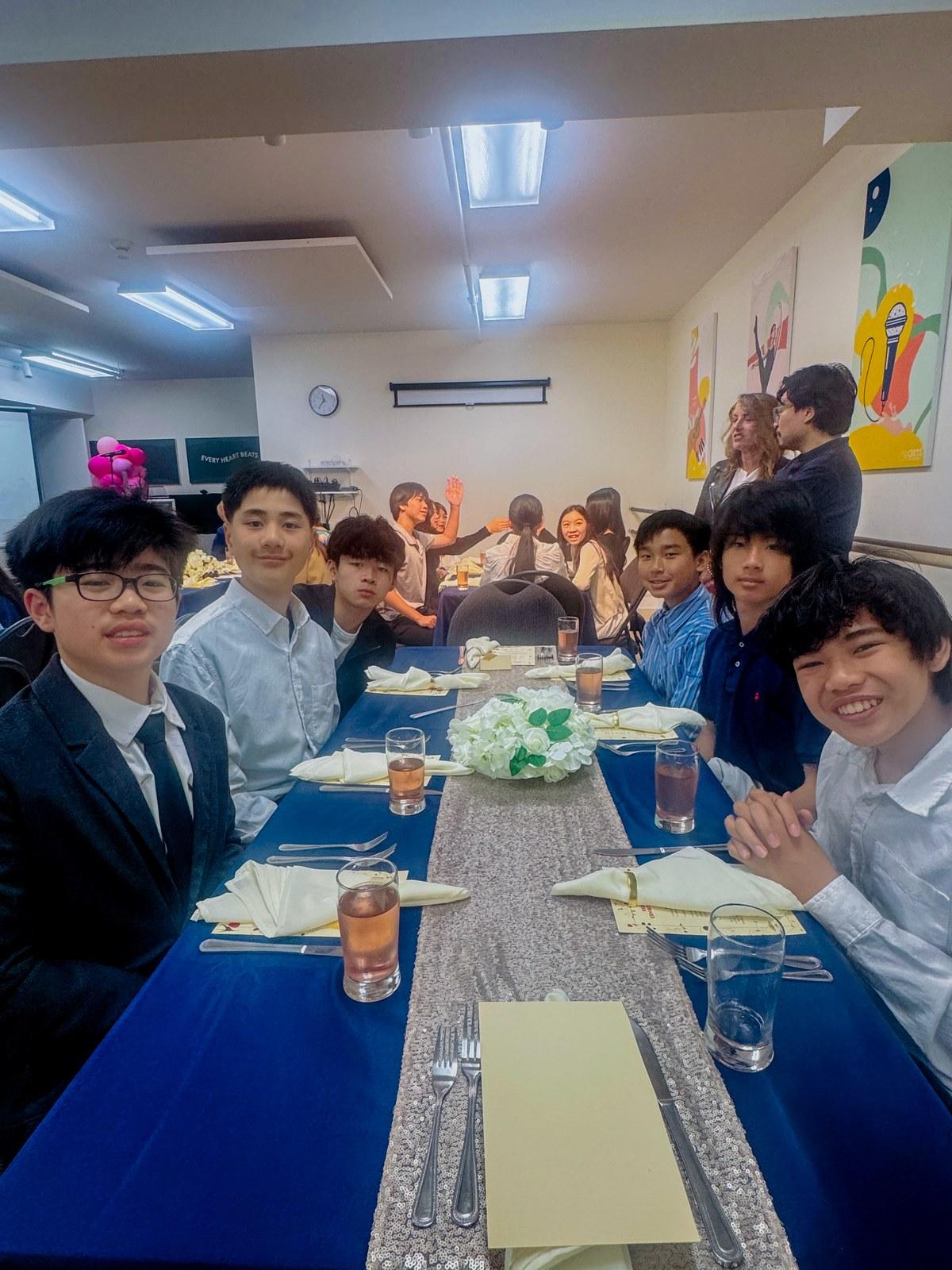 Reach to Teach students celebrate the end of their program at the Collaboration Celebration dinner.